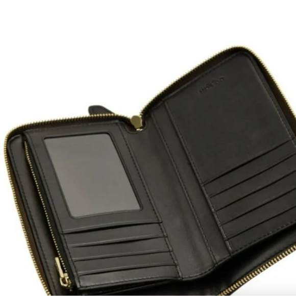 Coach Dark Brown Signature Wallet barely used, no scratches or dings